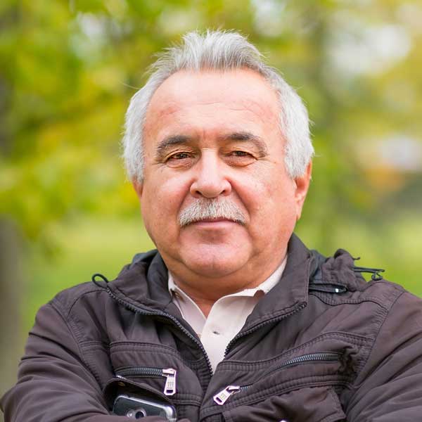 older man looking at camera