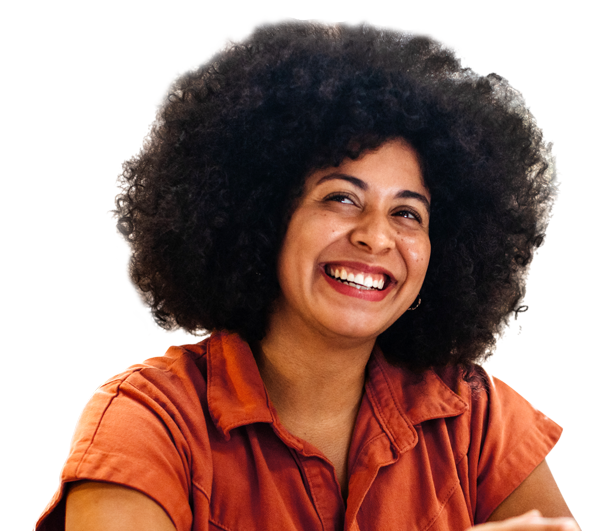 smiling woman in orange colored shirt