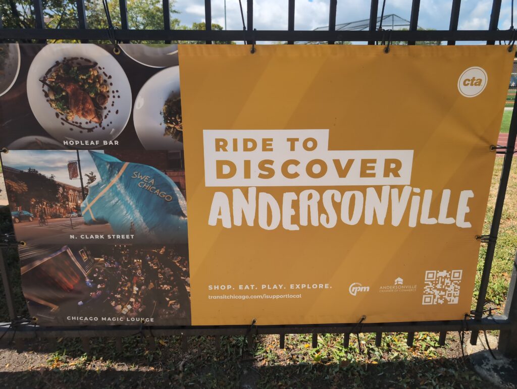 Banner depicting local bars and lounges on a fence in Andersonville. 